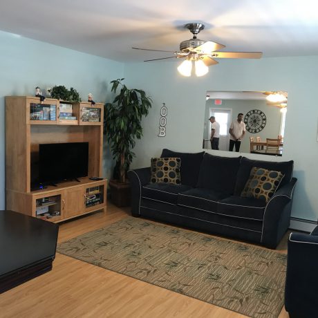 Living room couch and entertainment center