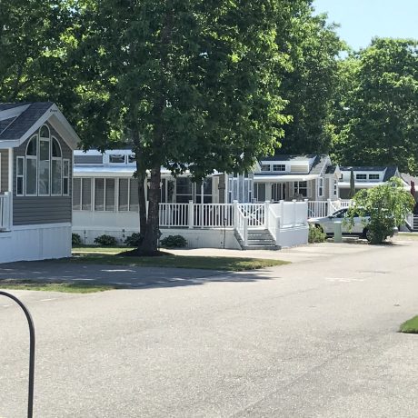 Exterior of Units at Seacoast Resort with big trees
